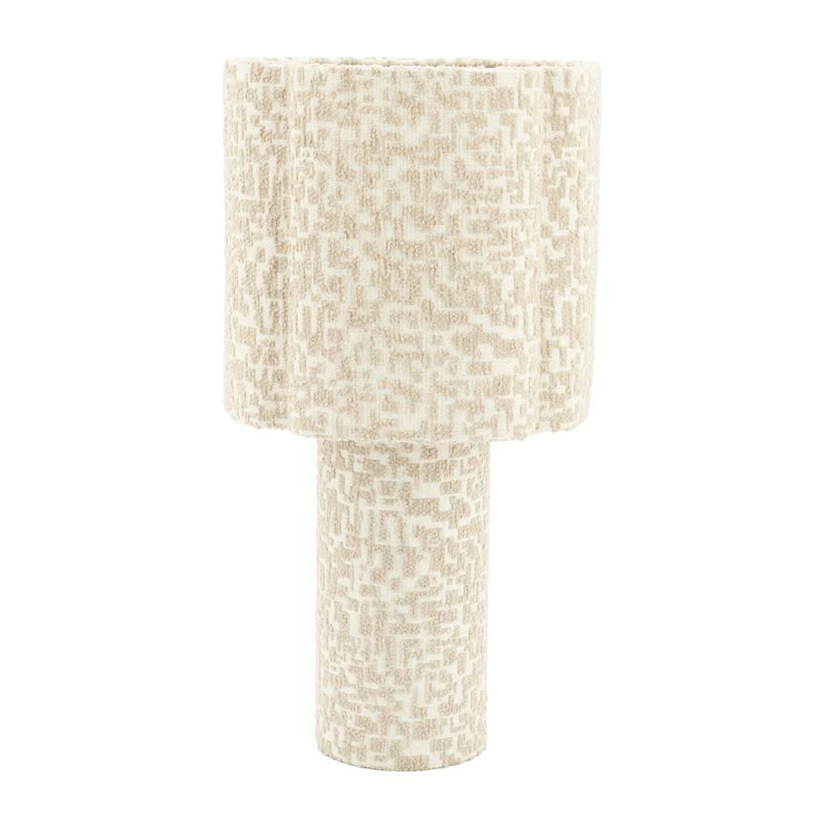 Stoffen tafellamp met organisch geblokte print in taupe op wit. De voet en kap zijn beide gestoffeerd. De vorm van de kap is subtiel gebogen waardoor het van boven een abstracte bloem met 4 blaadjes lijkt.
